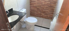 casa proximo a praia ginipabu a 5 minutos mobiliada e bem arejada para finais de semanas